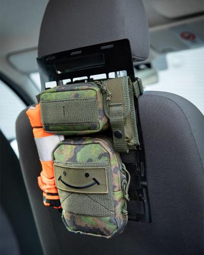 Särmä TST Rigid PALS Panel. A tactical spot in the car. Old model in the picture - the general idea is the same.