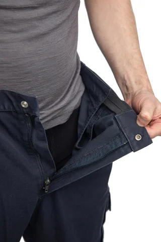 Zipper fly with a snap fastener.