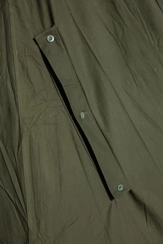 A close-up on one of the arm holes.