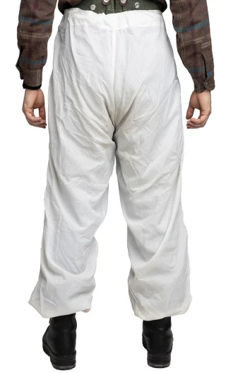 Pictured is a size 175 / 86 cm (height / waist) model wearing size Medium snow pants with long johns and wool trousers worn underneath.