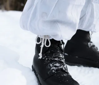 The leg cuffs usually have drawcord adjustments as well. Sometimes they're missing.