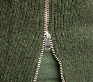 They come with long zippers on the sides that enable you to wrap the pants around your legs without taking off your boots.