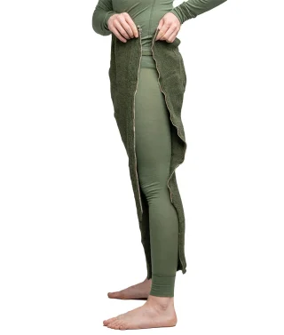 They come with long zippers on the sides that enable you to wrap the pants around your legs without taking off your boots.
