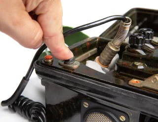 A fidget button for soldiers who don't have an AR-15 with a forward assist.