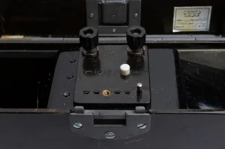 Knobs for attaching the twin cables. The other ends are connected to another phone like this.