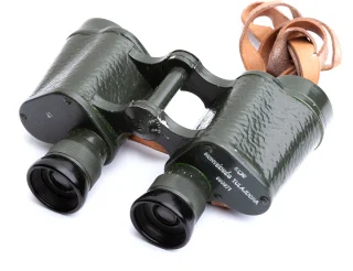 Leather strap included.