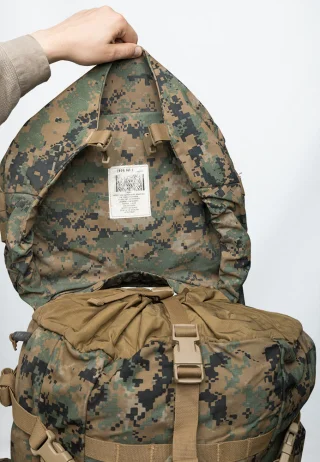 Drawcord closure with reinforcing strap.