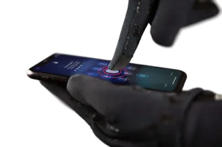 Conductive textile on thumb, index, and middle fingers to handle touch screens.