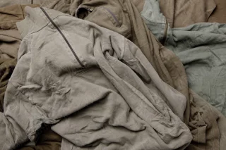 Colour shades vary a bit but all are sort of olive gray, or STEINGRAU-OLIV in German.