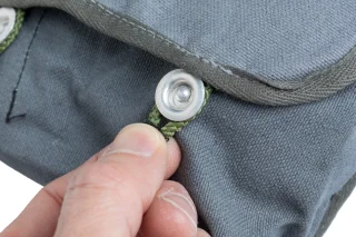 The Germanic baby blue-gray pouch has metal buttons.
