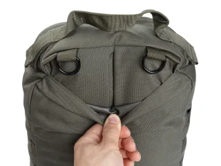 Flat pocket for stiffener or padding. Bellows into the main compartment.