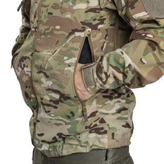 The pocket zippers are on the sides, which removes the zip pulls and such from the chest region, which might chafe or cling onto things.