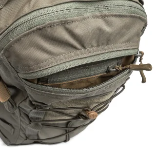 The pack has a smaller compartment with another pocket for small items.