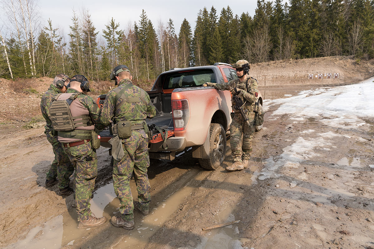 Loading up. The targets are set up against the embankment.