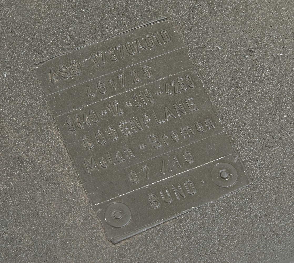 A print on the mat with info on the origins of the mat.