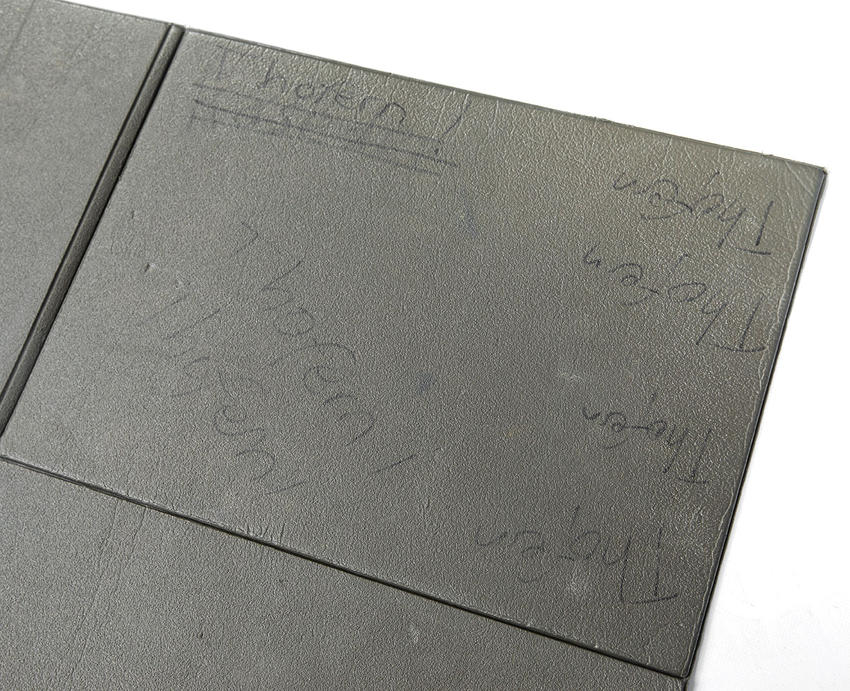 A corner of the which onto which Thofern has been written seven times.