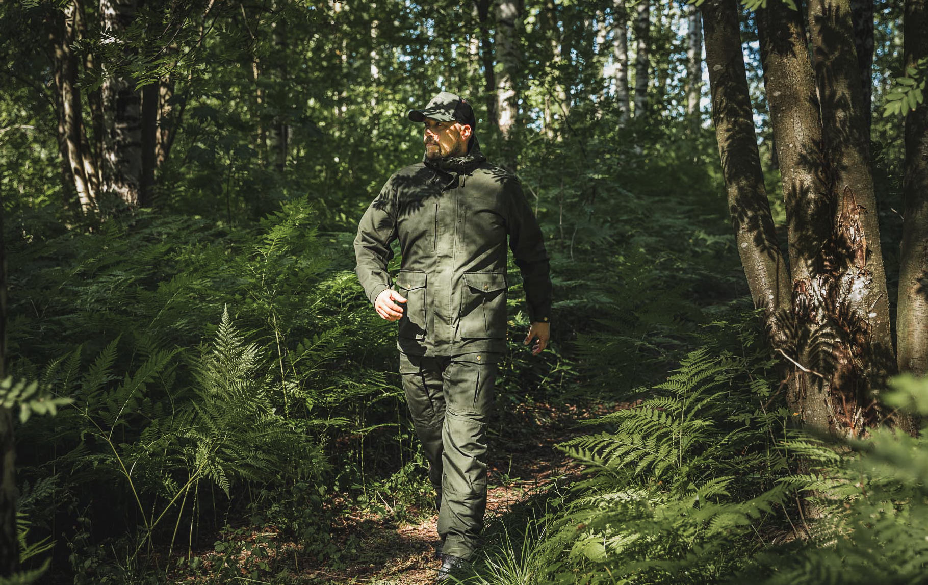 Longsleeved and longlegged hiking clothes>
<p>It is wise to have adjustable pant legs and jacket sleeves. Hook and loop adjustment is nice because you can make the sleeves/legs really snug if necessary. You can also wear the pant legs inside long hiking socks. If you crawl elbows deep in grass, it might be good to wear gloves, too.</p>
<img loading=