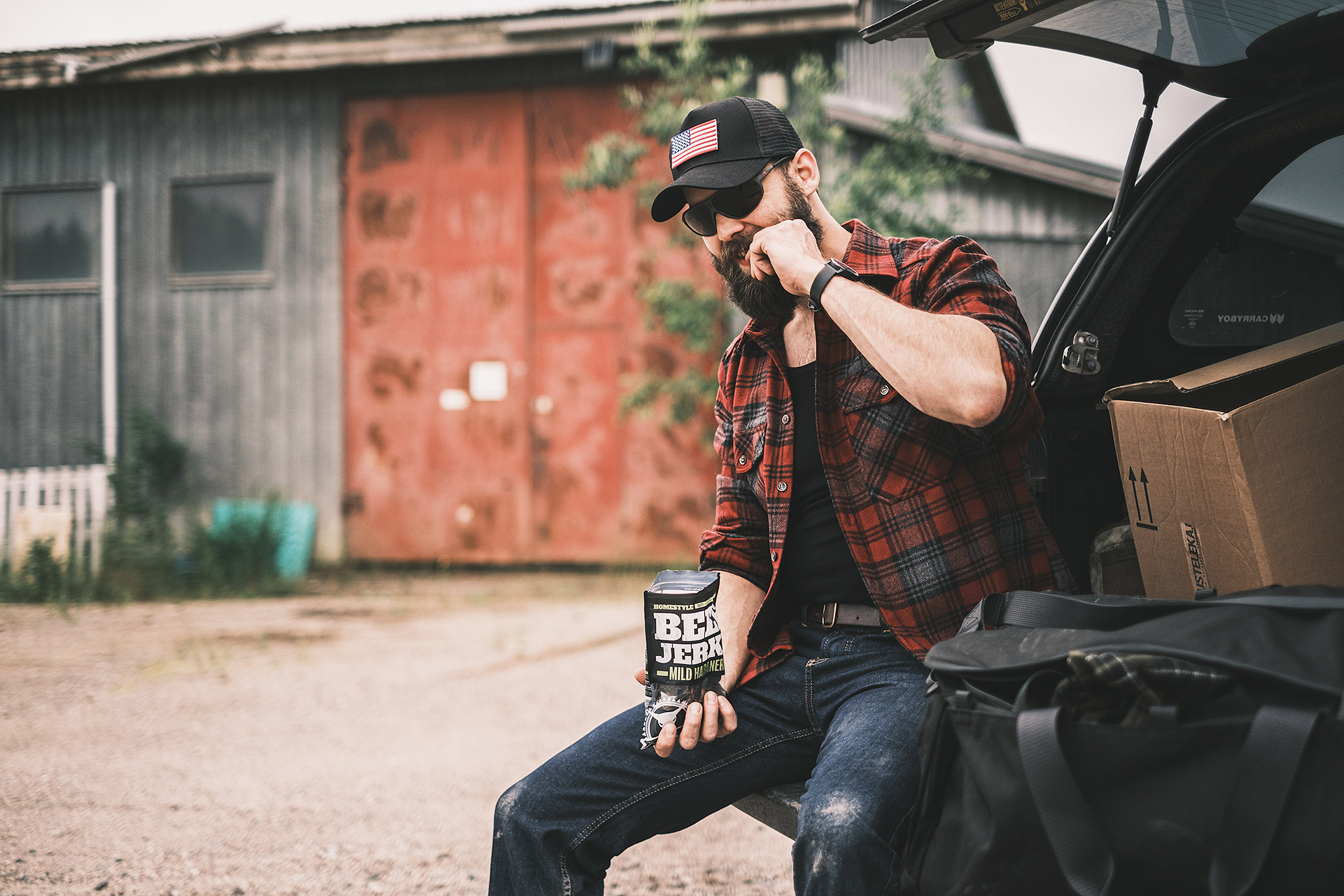 Pickup-man eating jerky