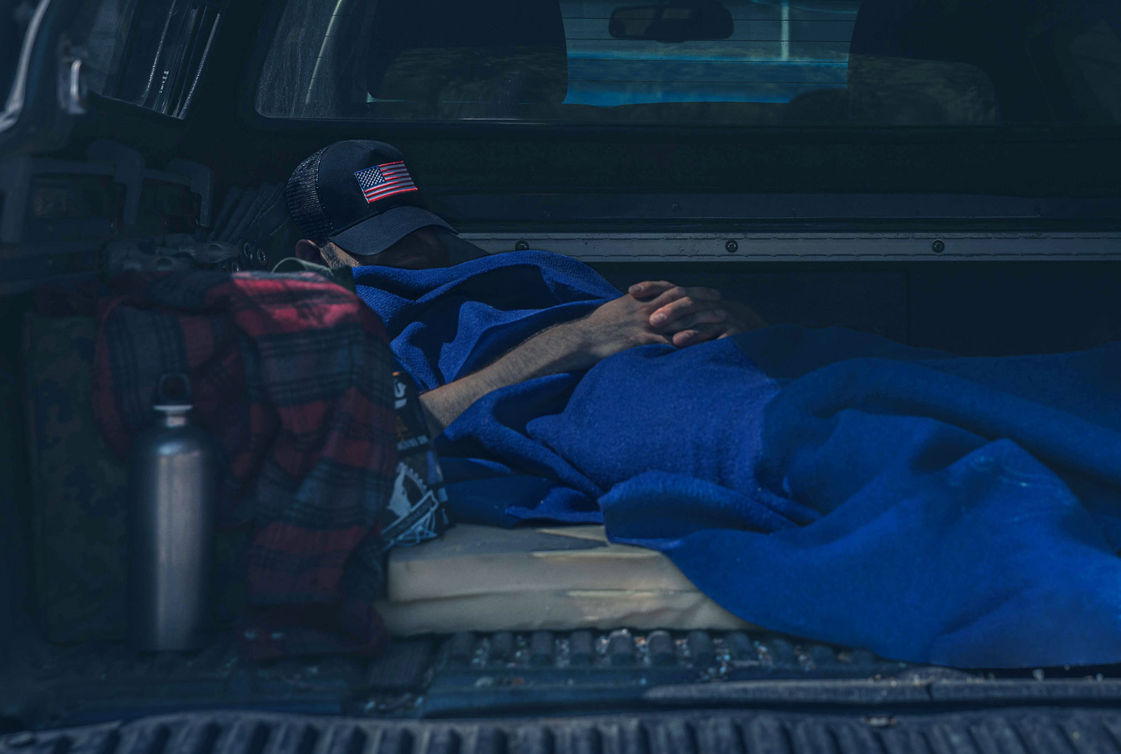 Man sleeping in a back of a car</a> </br>

<p>Outside the above-mentioned ones, you basically have two options: Sleep in the car or sleep outside the car in some sort of a <a href=