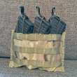 US MOLLE II bandoleer pouch for three magazines, surplus. Easily convertible to hold AK mags with some extra DIY materials.