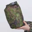 Särmä TST Dry Bag. 5L dry bag with Särmä TST L3 Loft Jacket and Trousers inside, in size Medium Regular and there´s still room to spare.