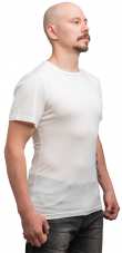 Särmä Merino Wool T-shirt. Our model's measurements are about 175 / 96 cm, wearing size Medium shirt.
