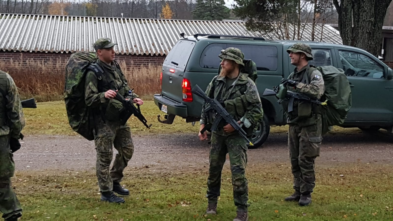 Three soldiers geared up ready for the march.