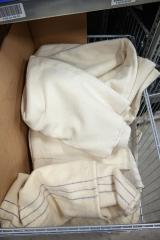 British blanket, cream, surplus. The condition and color can vary a bit from more white to more creamy. Some have thin blue stripes to make folding easier.