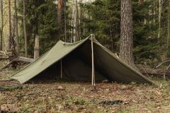 Norwegian Rhombus Shelter Quarter, Olive Drab, Surplus. Pictured here is the 4-person tent erected wrong. Just two of these can be made into a shelter that's definitely better than nothing. Poles, ropes and pegs not included.