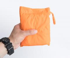 Särmä backpack rain cover, orange.