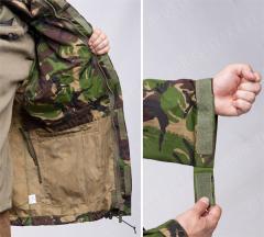 British CS95 Windproof Smock, DPM, surplus. These are unlined, which means you can fit anything underneath. The sleeve cuffs have a simple hook and loop adjustment.