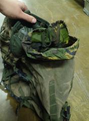 British Patrol Pack 30 Litre, DPM, Surplus. Every compartment usually has a weather sock of varying condition. Here's a side pouch.