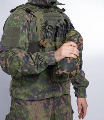 Särmä TST L6 Rain Poncho, M05 woodland camo. Pack size - relatively small.