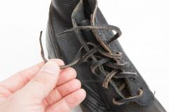 Russian navy shoes, with rubber soles, surplus. Sometimes the laces are leather. Usually too short also.