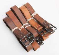 Swiss service belt, leather, surplus. The leather colours vary, but all are shades of brown. They can be darkened with use and grease.