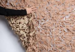 British camo net, 2 x 3 m, khaki, surplus. The base colour is khaki. For camo artists, it's an empty canvas!
