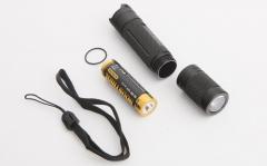 Fenix E12 flashlight. Works with a common AA-battery (not included).