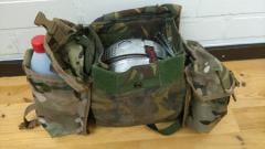 British PLCE gas mask bag, DPM, surplus. A camping kitchen carried in one package. Two extra MTP pouches were attached to the sides in the best DIY fashion.