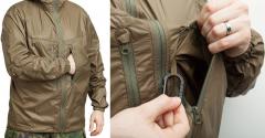 Särmä TST L3 Wind Jacket. Zippered chest pockets with "idiot cord" tie down points inside. Carabine clip sold separately.