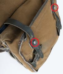 Finnish Demolitions Bag, Surplus. These knobs may not be present. It doesn't affect using the bag - unless you count the fact that having and using them slows you down.