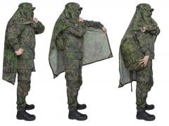 Särmä TST L7 Camouflage cloak. Open the "sleeve" press studs and doff your pack. You can don and doff your pack without removing the cloak.