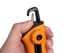 Fiskars Xtract SW73 camping saw. When clipped onto something the saw is prevented from opening.