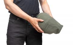 Jämä green Luhka. Packs inside its own hood.