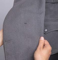 Finnish M36 wool tunic #12. A few holes on the arm.