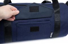 Jämä Duffel Bag. There is a small velcro pocket on one side.