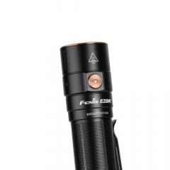 Fenix E28R Rechargeable Flashlight. Side switch with a battery level indicator in the bullseye.