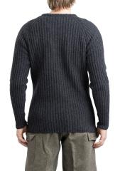 Särmä Merino Wool Sweater. The model in the picture  is 175 cm (5’9”) tall, with a 98 cm (38.6”) chest and ja 86 cm (33.9”) waist. He is wearing a size M sweater.