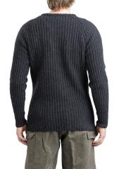 Särmä Merino Wool Sweater. The model in the picture is 175 cm (5’9”) tall, with a 98 cm (38.6”) chest and ja 86 cm (33.9”) waist. He is wearing a size M sweater.