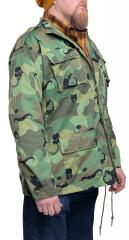 Beninese Anti-Poaching BDU Jacket, Surplus. The model is 183 cm tall, has a 116 cm chest and weighs 92 kg. He is wearing the 116 cm jacket.