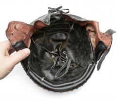 Romanian M73 Paratrooper Helmet, Surplus. The lining is made of leather but the style and color can vary.